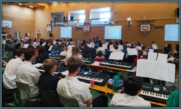 students playing musical instruments in the hall